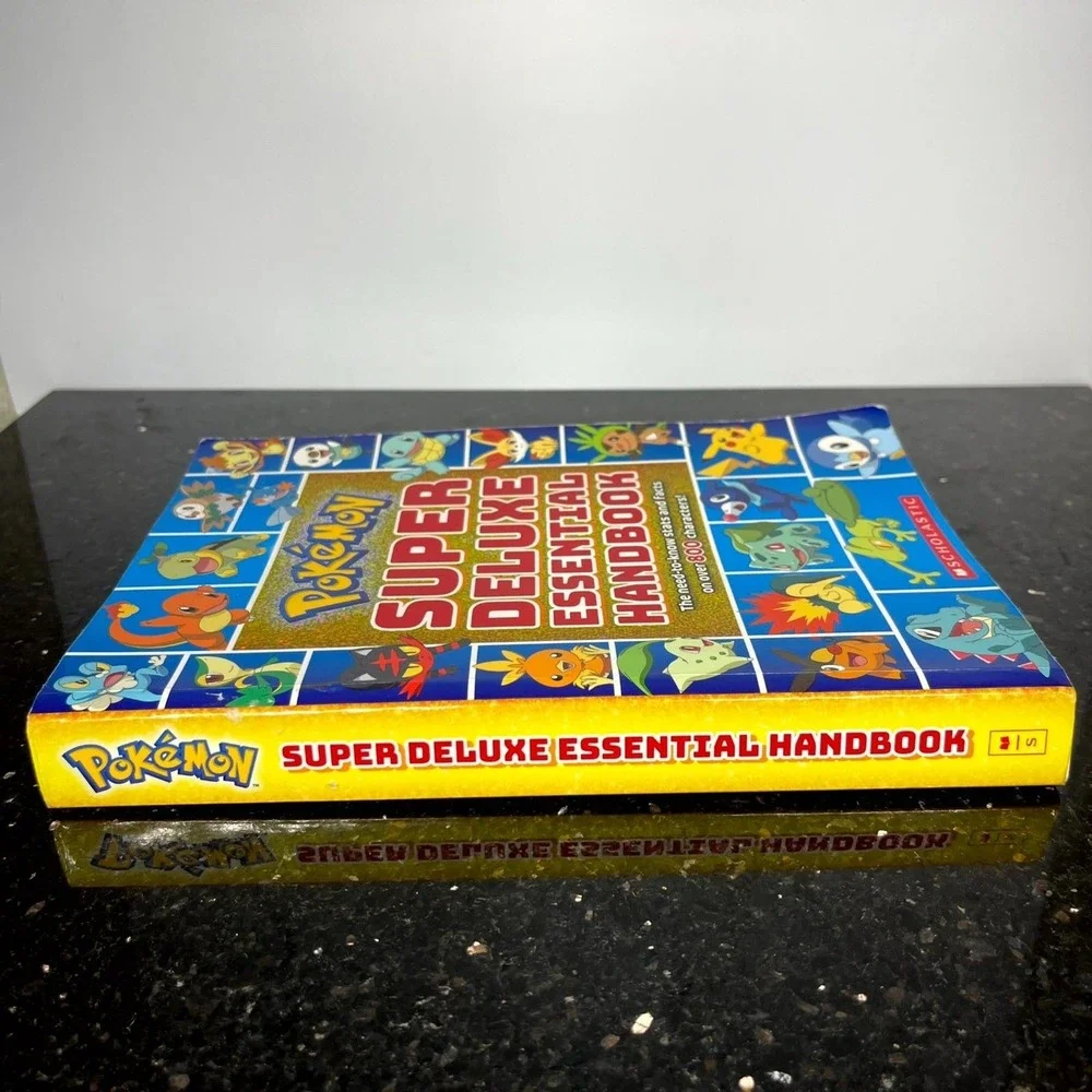 Pokemon Super Deluxe Essential Handbook 2018 Scholastic Characters Stats‎